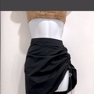 Dolls kill Super versatile black mini/midi skirt. NWT never worn